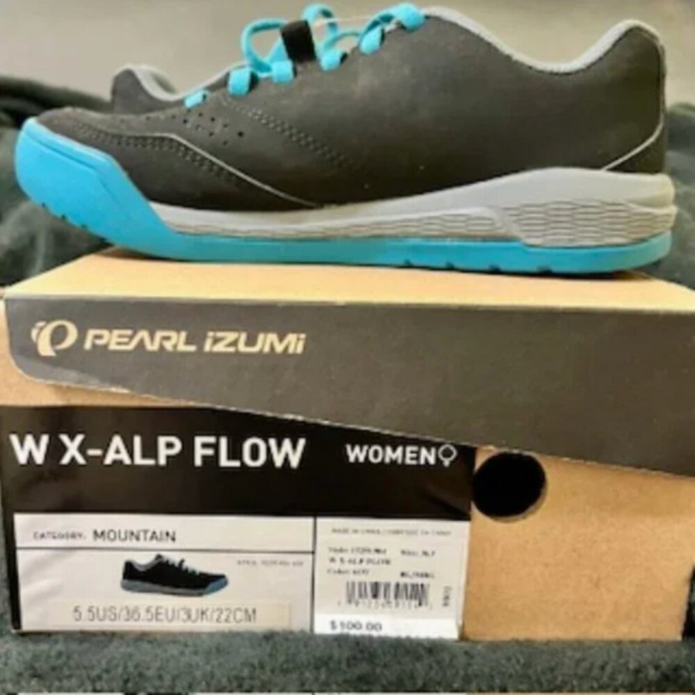 NEW in box. Size 5. Never worn. Color: Black/Mountain/Mirage